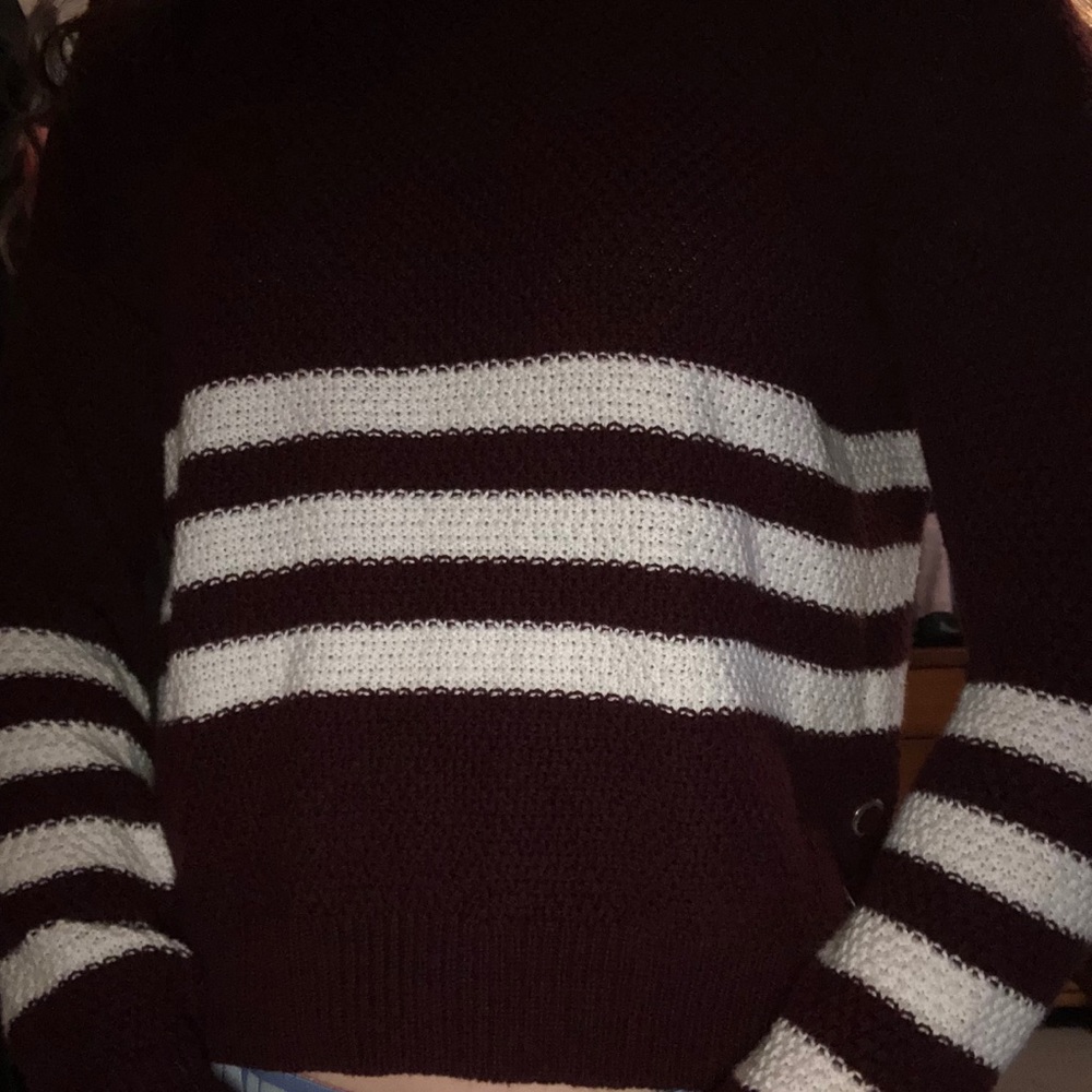 Maroon sweater with white strips